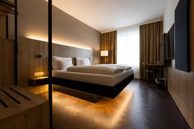 Ein Bett oder Betten in einem Zimmer der Unterkunft GINN City & Lounge Yorck Berlin