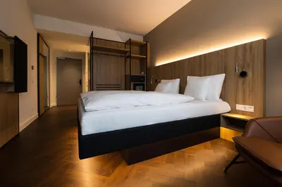 Ein Bett oder Betten in einem Zimmer der Unterkunft GINN City & Lounge Yorck Berlin