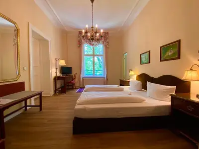 Ein Bett oder Betten in einem Zimmer der Unterkunft Hotel Kronprinz