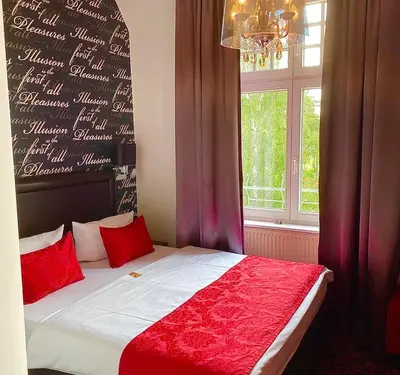Ein Bett oder Betten in einem Zimmer der Unterkunft Hotel Kronprinz