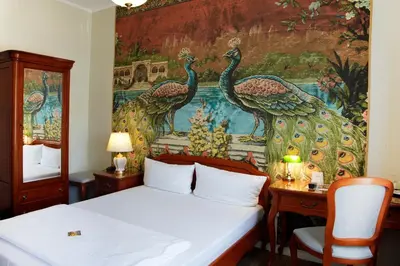 Ein Bett oder Betten in einem Zimmer der Unterkunft Hotel Kronprinz
