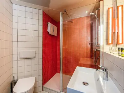 Ein Badezimmer in der Unterkunft ibis Styles Berlin Treptow