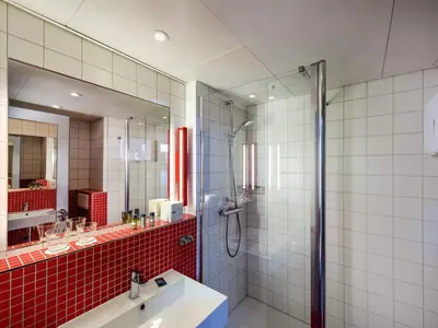 Ein Badezimmer in der Unterkunft ibis Styles Berlin Treptow