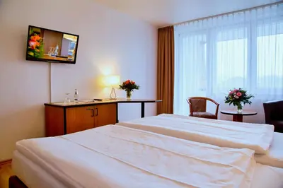 Ein Bett oder Betten in einem Zimmer der Unterkunft Comfort Hotel Bernau