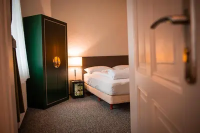 Ein Bett oder Betten in einem Zimmer der Unterkunft Bölsche Hotel