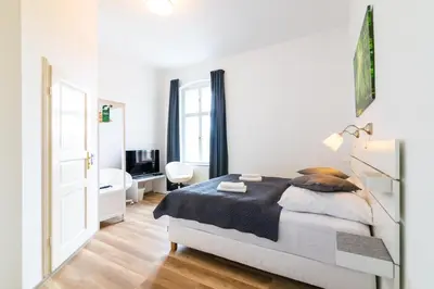 Ein Bett oder Betten in einem Zimmer der Unterkunft Hotel am Hain