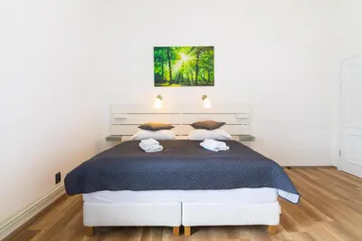 Ein Bett oder Betten in einem Zimmer der Unterkunft Hotel am Hain