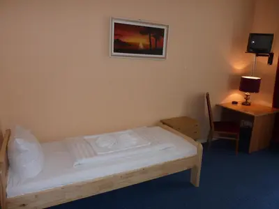 Ein Bett oder Betten in einem Zimmer der Unterkunft Hotel-Pension Spree