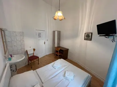 Ein Bett oder Betten in einem Zimmer der Unterkunft Hotel-Pension Spree