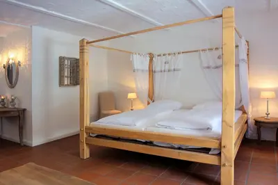 Ein Bett oder Betten in einem Zimmer der Unterkunft Spreewaldresort Seinerzeit