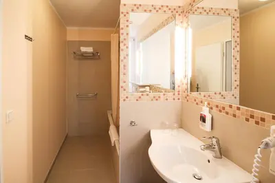 Ein Badezimmer in der Unterkunft Hotel Sachsenhof