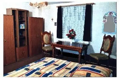 Ein Bett oder Betten in einem Zimmer der Unterkunft Bramkamp Pension