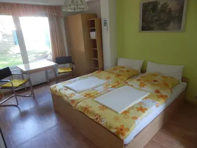 Ein Bett oder Betten in einem Zimmer der Unterkunft Bramkamp Pension
