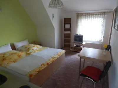 Ein Bett oder Betten in einem Zimmer der Unterkunft Bramkamp Pension