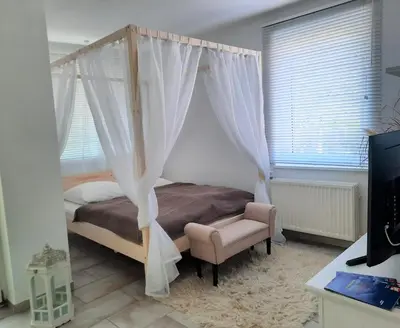 Ein Bett oder Betten in einem Zimmer der Unterkunft HOLI DAY SPA Appartement 2