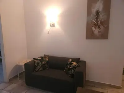 Ein Sitzbereich in der Unterkunft HOLI DAY SPA Appartement 2