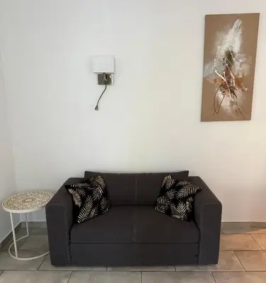 Ein Sitzbereich in der Unterkunft HOLI DAY SPA Appartement 2