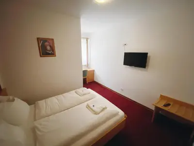 Ein Bett oder Betten in einem Zimmer der Unterkunft Waldrestaurant & Hotel