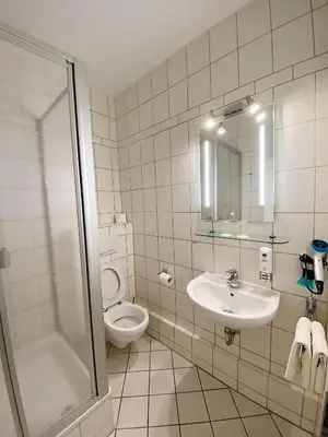 Ein Badezimmer in der Unterkunft Waldrestaurant & Hotel