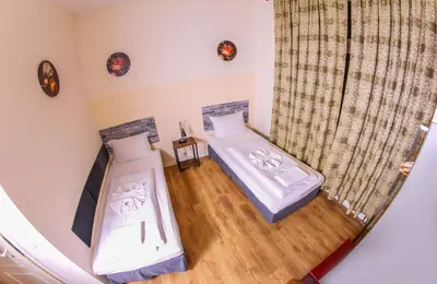 Ein Bett oder Betten in einem Zimmer der Unterkunft Hotel Karlshorst