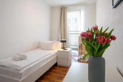 Ein Bett oder Betten in einem Zimmer der Unterkunft Apartments am Brandenburger Tor