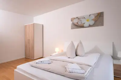 Ein Bett oder Betten in einem Zimmer der Unterkunft Apartments am Brandenburger Tor