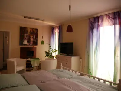 Ein Bett oder Betten in einem Zimmer der Unterkunft Ferienzimmer Weltenbummler,Rheinsberg