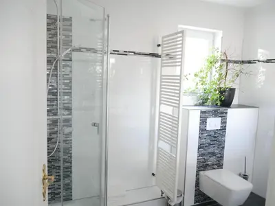 Ein Badezimmer in der Unterkunft Ferienzimmer Weltenbummler,Rheinsberg