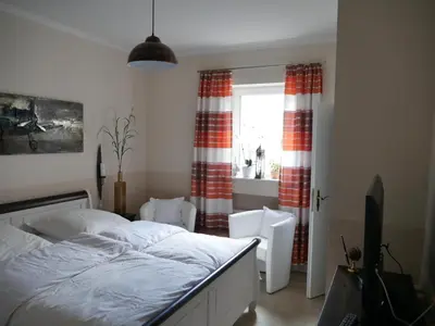 Ein Bett oder Betten in einem Zimmer der Unterkunft Ferienzimmer Weltenbummler,Rheinsberg