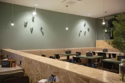 Ein Restaurant oder anderes Speiselokal in der Unterkunft Holiday Inn - the niu, Amity Potsdam by IHG