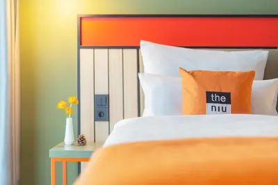Ein Bett oder Betten in einem Zimmer der Unterkunft Holiday Inn - the niu, Amity Potsdam by IHG