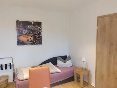 Ein Bett oder Betten in einem Zimmer der Unterkunft FeWo in Köpenick