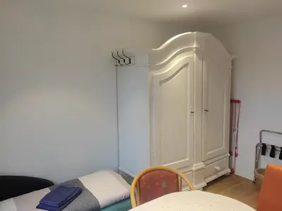 Ein Bett oder Betten in einem Zimmer der Unterkunft FeWo in Köpenick