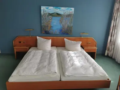 Ein Bett oder Betten in einem Zimmer der Unterkunft Hotel Kaiserhof