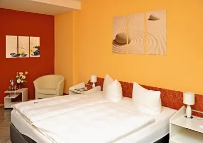 Ein Bett oder Betten in einem Zimmer der Unterkunft Hotel Kaiserhof