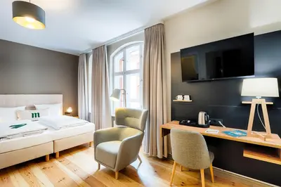 Ein Bett oder Betten in einem Zimmer der Unterkunft martas Hotel Berlin-Mitte