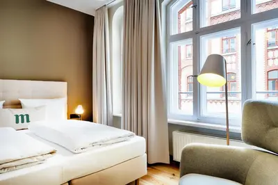 Ein Bett oder Betten in einem Zimmer der Unterkunft martas Hotel Berlin-Mitte