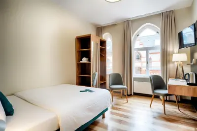 Ein Bett oder Betten in einem Zimmer der Unterkunft martas Hotel Berlin-Mitte