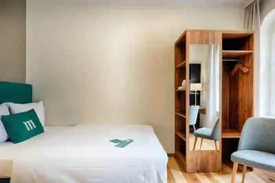 Ein Bett oder Betten in einem Zimmer der Unterkunft martas Hotel Berlin-Mitte
