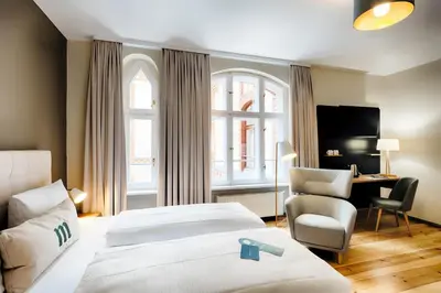 Ein Bett oder Betten in einem Zimmer der Unterkunft martas Hotel Berlin-Mitte
