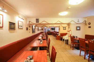 Ein Restaurant oder anderes Speiselokal in der Unterkunft Hotel Atrium Charlottenburg