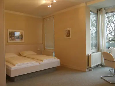 Ein Bett oder Betten in einem Zimmer der Unterkunft Hotel St.-Michaels-Heim