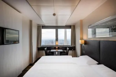 Ein Bett oder Betten in einem Zimmer der Unterkunft Park Inn by Radisson Berlin Alexanderplatz
