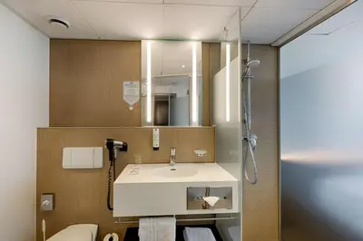 Ein Badezimmer in der Unterkunft Park Inn by Radisson Berlin Alexanderplatz
