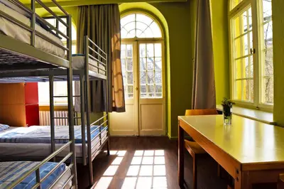 Ein Bett oder Betten in einem Zimmer der Unterkunft Amstel House Hostel