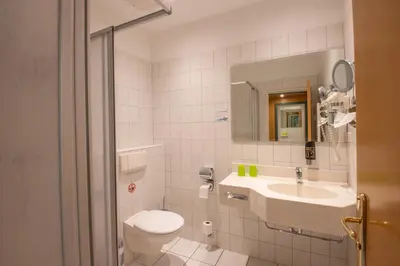 Ein Badezimmer in der Unterkunft Seehotel Bollmannsruh