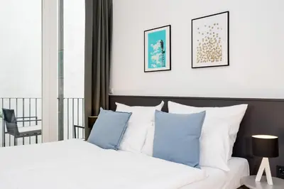 Ein Bett oder Betten in einem Zimmer der Unterkunft BENSIMON apartments Prenzlauer Berg