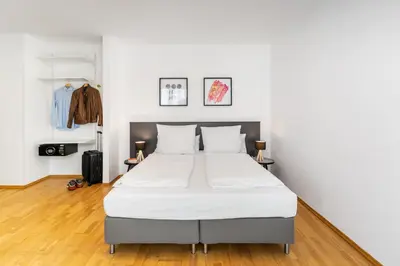 Ein Bett oder Betten in einem Zimmer der Unterkunft BENSIMON apartments Prenzlauer Berg