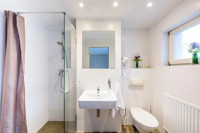 Ein Badezimmer in der Unterkunft fjord hotel berlin