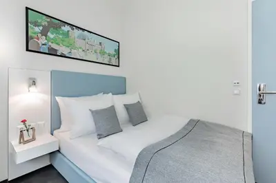 Ein Bett oder Betten in einem Zimmer der Unterkunft Garner Hotel Berlin - Checkpoint Charlie by IHG